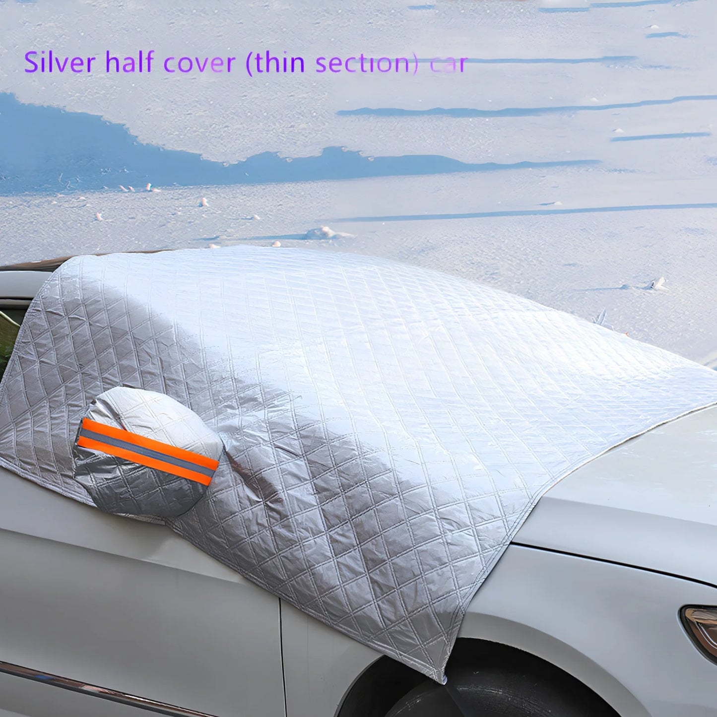 Silver magnetic windshield cover showing aluminium foil coating and edge magnets for vehicle protection