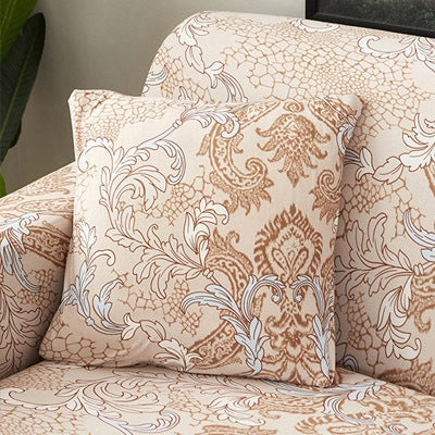 Printed stretchable sofa slipcover covering a three-seater sofa in a modern geometric pattern