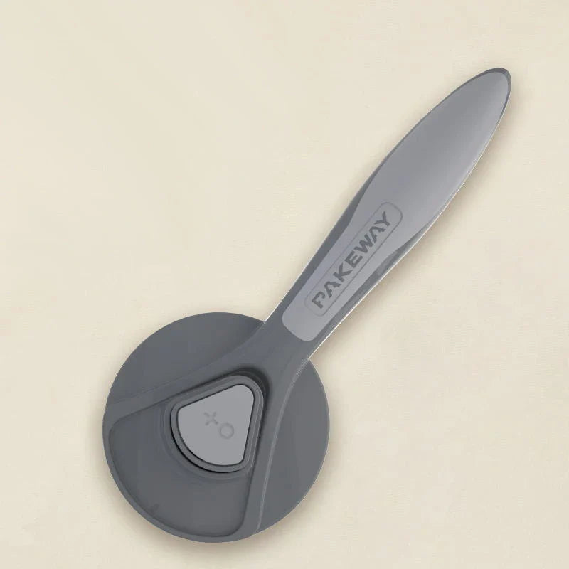 Ergonomic pet grooming brush in mint green, cherry blossom powder, and gentleman grey