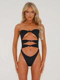 Women's nylon one-piece swimsuit with hollow-out design in S, M, L sizes