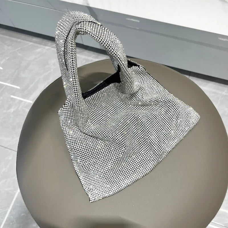 Silver cotton thread handbag with rhinestone detailing and open outer pocket