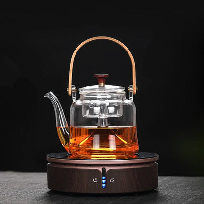 Japanese style glass bamboo handle teapot kettle on a wooden table