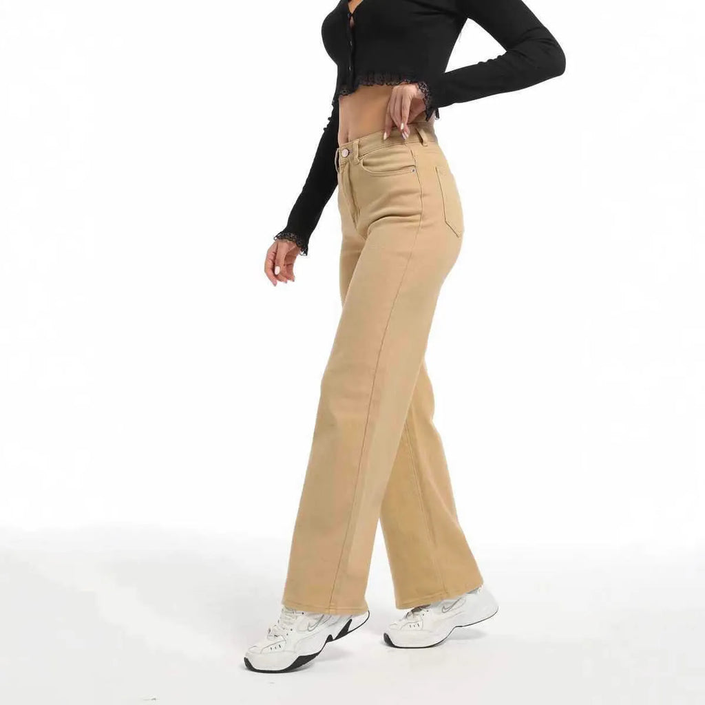Women's straight leg jeans in apricot colour with high waist and wide leg trousers cut
