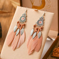 Bohemian feather drop earrings in leaf shape with pattern details, available in multiple electroplated colours.