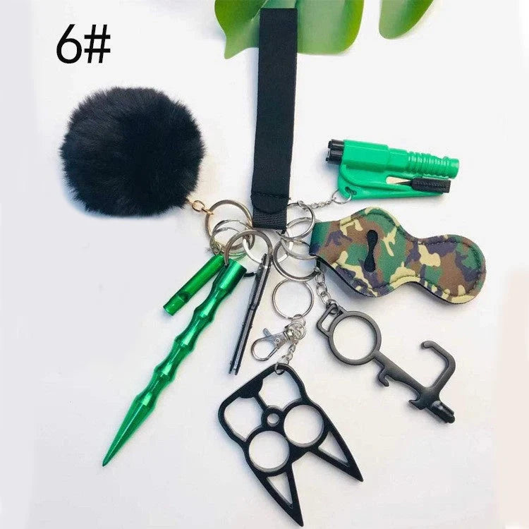 Self-defense keychain set for women with 11 safety tools including alarm, window breaker, and whistle
