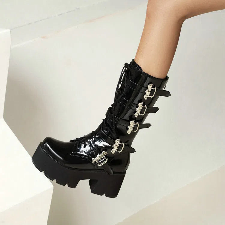Women's chunky heel thigh-high boots in black patent leather with side zipper and round toe