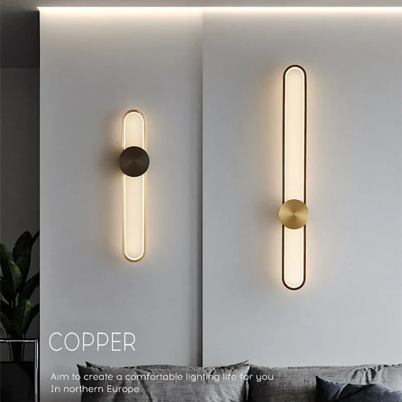 Round modern wall lamp with iron shade in gold or black finish options