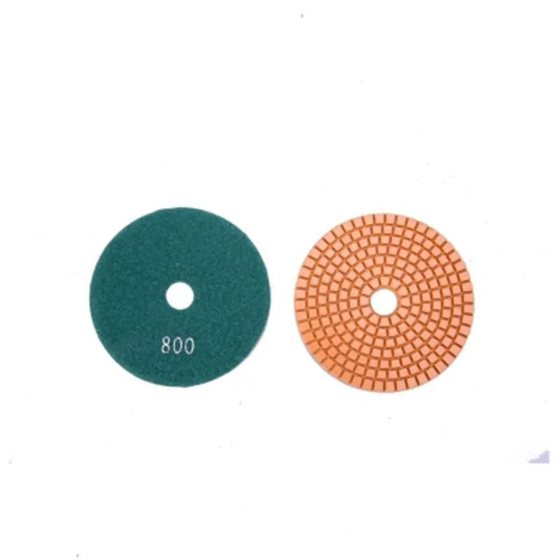 Set of 10 stone polishing pads showing different grits, 80mm diameter with 10mm centre holes