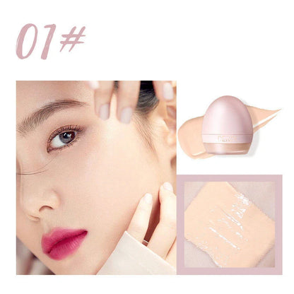 4-colour foundation cream compact with built-in sponge and small spoon applicator