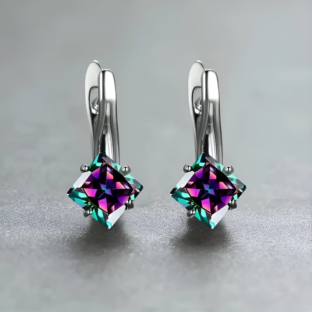 A pair of women's copper earrings with a diamond design made from inlaid zircon stones.