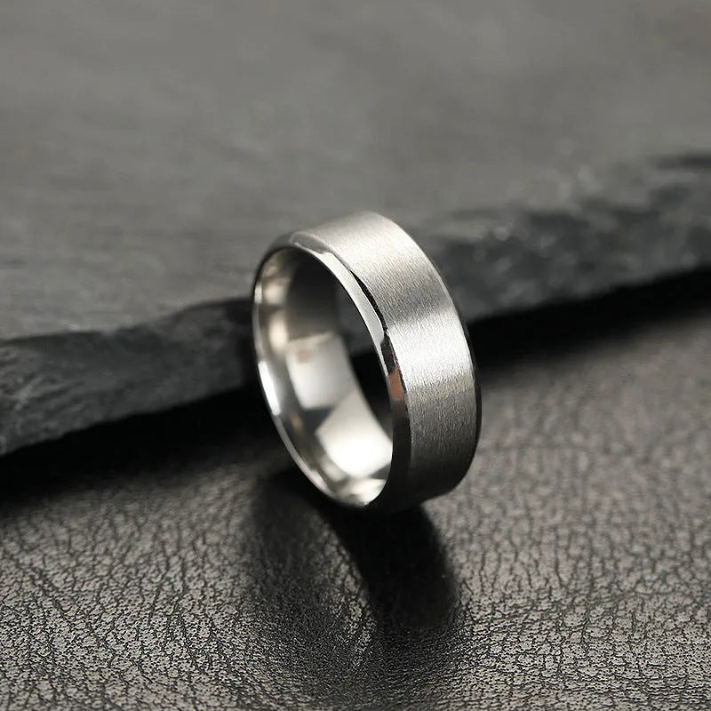 Titanium steel ring with electroplated matte finish in black, unisex geometric round design, available in sizes 6-13