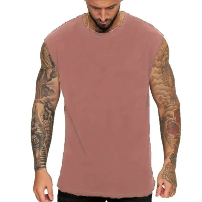 Men's loose solid colour cotton tank top t-shirt on a hanger, showing straight hem and sleeveless design.
