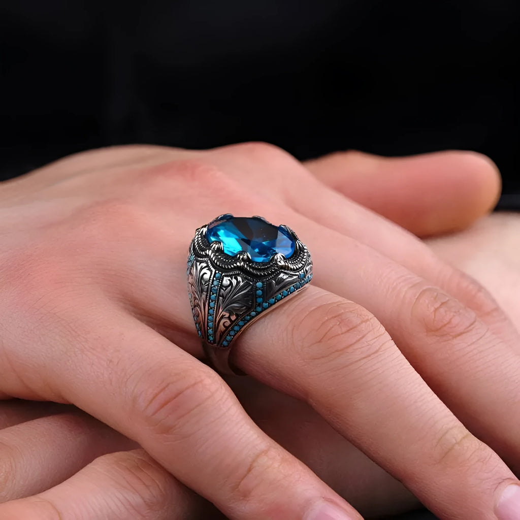 Antique silver geometric couple ring with blue zircon stone centrepiece showing European and American styling