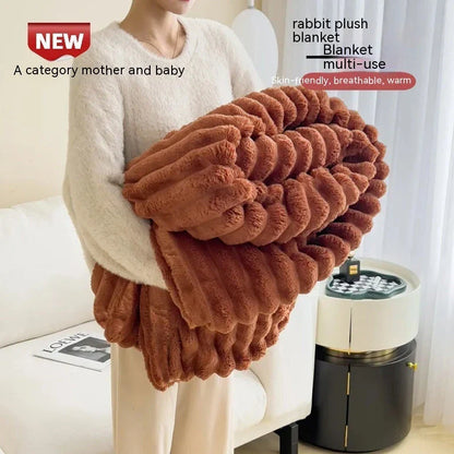 Soft, plush rabbit fur throw blanket in a variety of colors and sizes for cozy comfort at home or on the go.