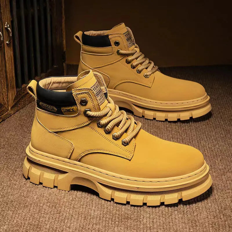 Men's brown lace-up Martin boots with round toe and rubber sole on a neutral background.