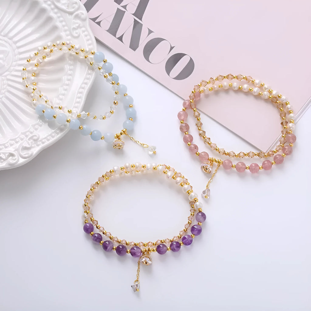 Women's double ring bracelet with crystal charms in choice of strawberry quartz, amethyst, or aquamarine colour.