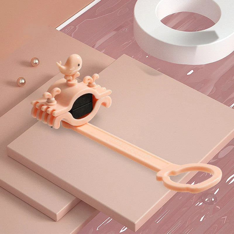 Children's faucet extender in blue, pink, and purple colours