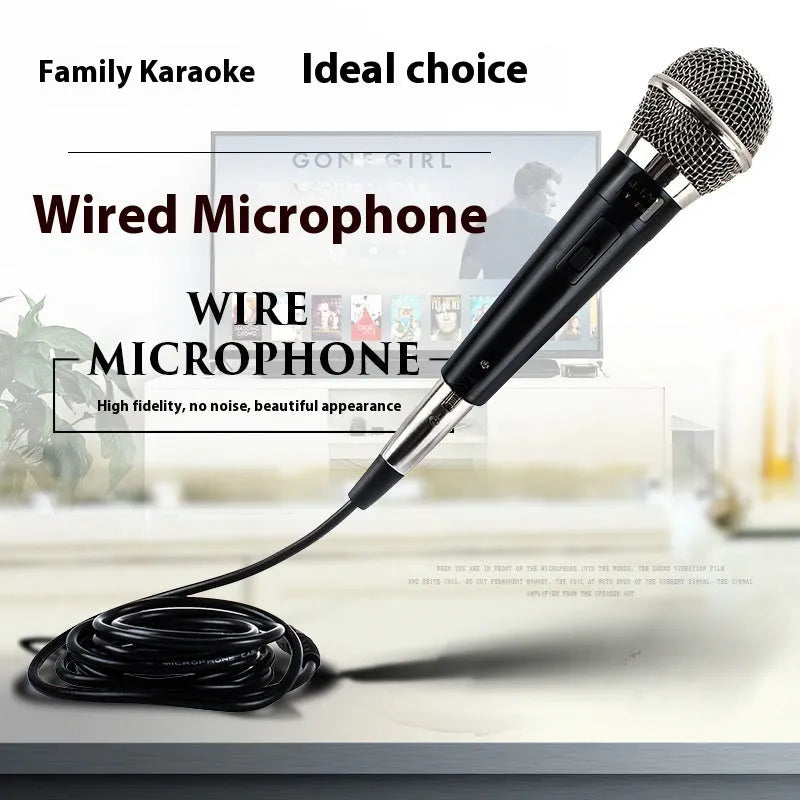 Black wired moving coil sound card live microphone with 3-metre thread cable on a table