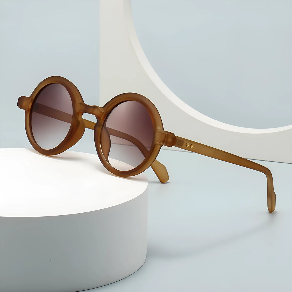 European American retro artistic round sunglasses with black frame and gray lenses, full-frame plastic design