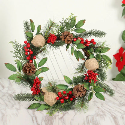 Christmas wreath with natural pine, pine cones, and berries for festive decoration