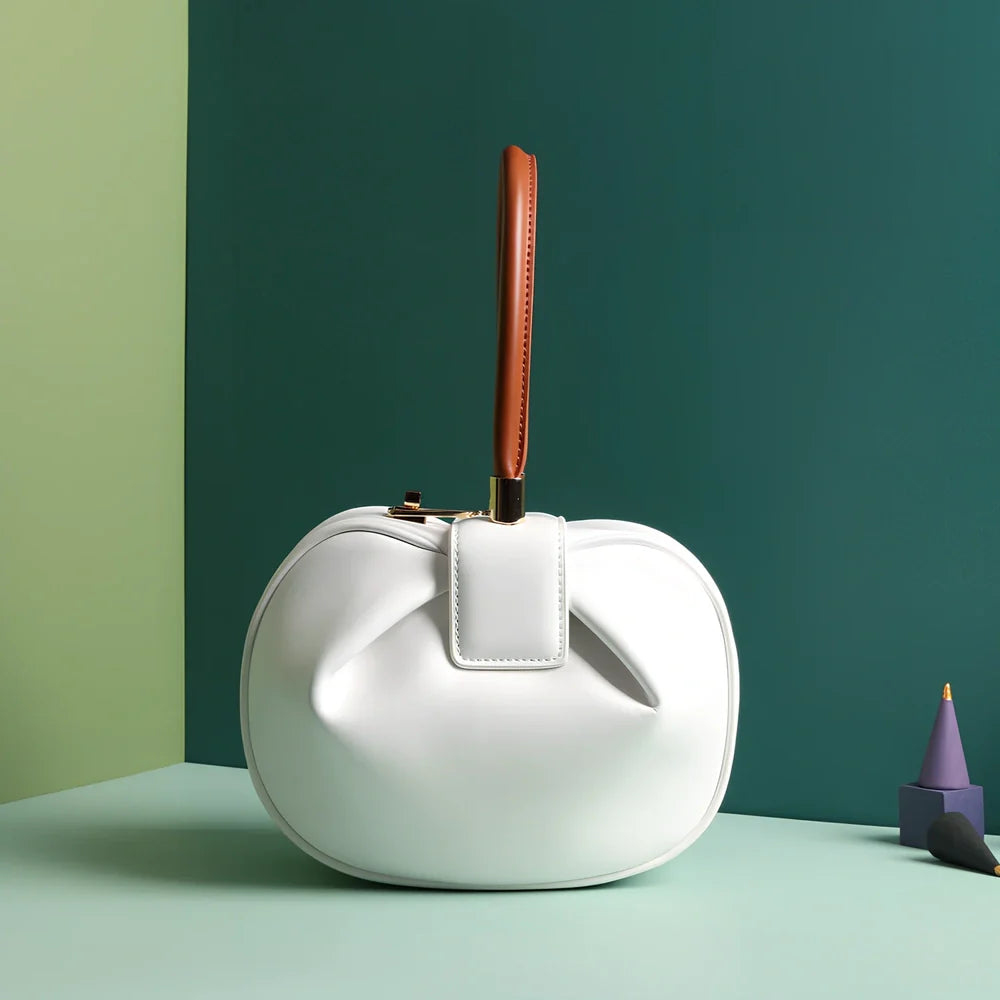 Women's cowhide leather tote bag in tramp shape with single handle and buckle, available in apricot, black, and other colours, big size 35cm x 40cm