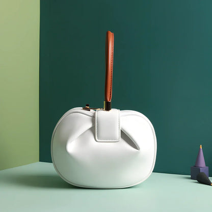 Women's cowhide leather tote bag in tramp shape with single handle and buckle, available in apricot, black, and other colours, big size 35cm x 40cm