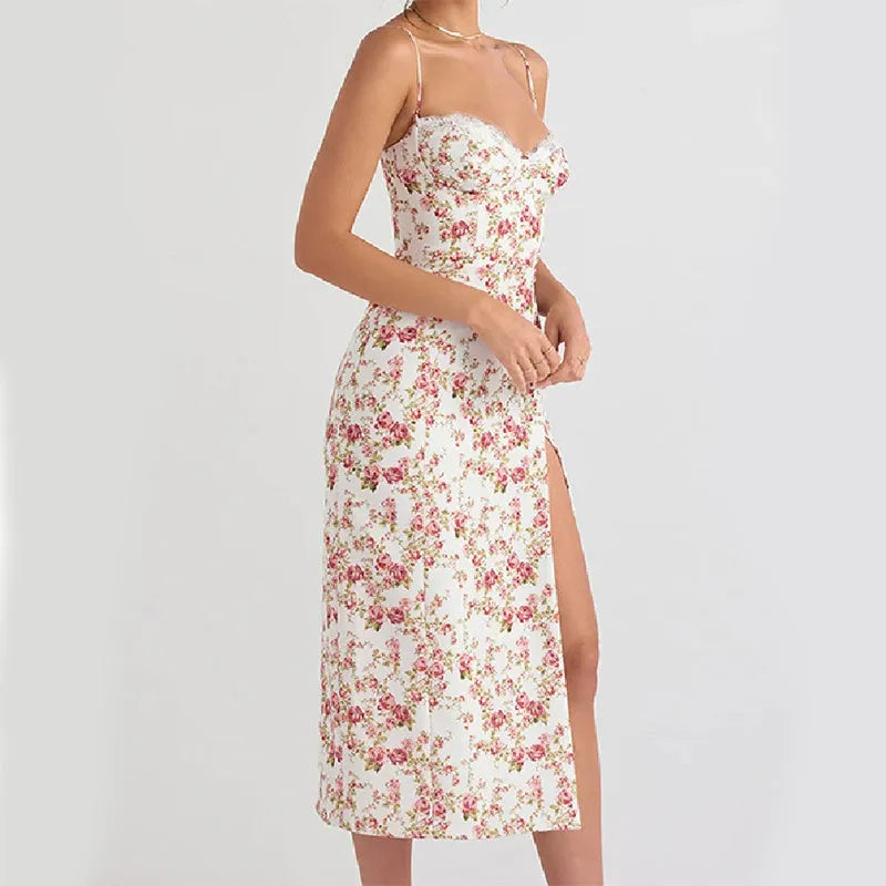 Women's floral lace print long dress with suspender straps and a thigh slit, shown in blue.