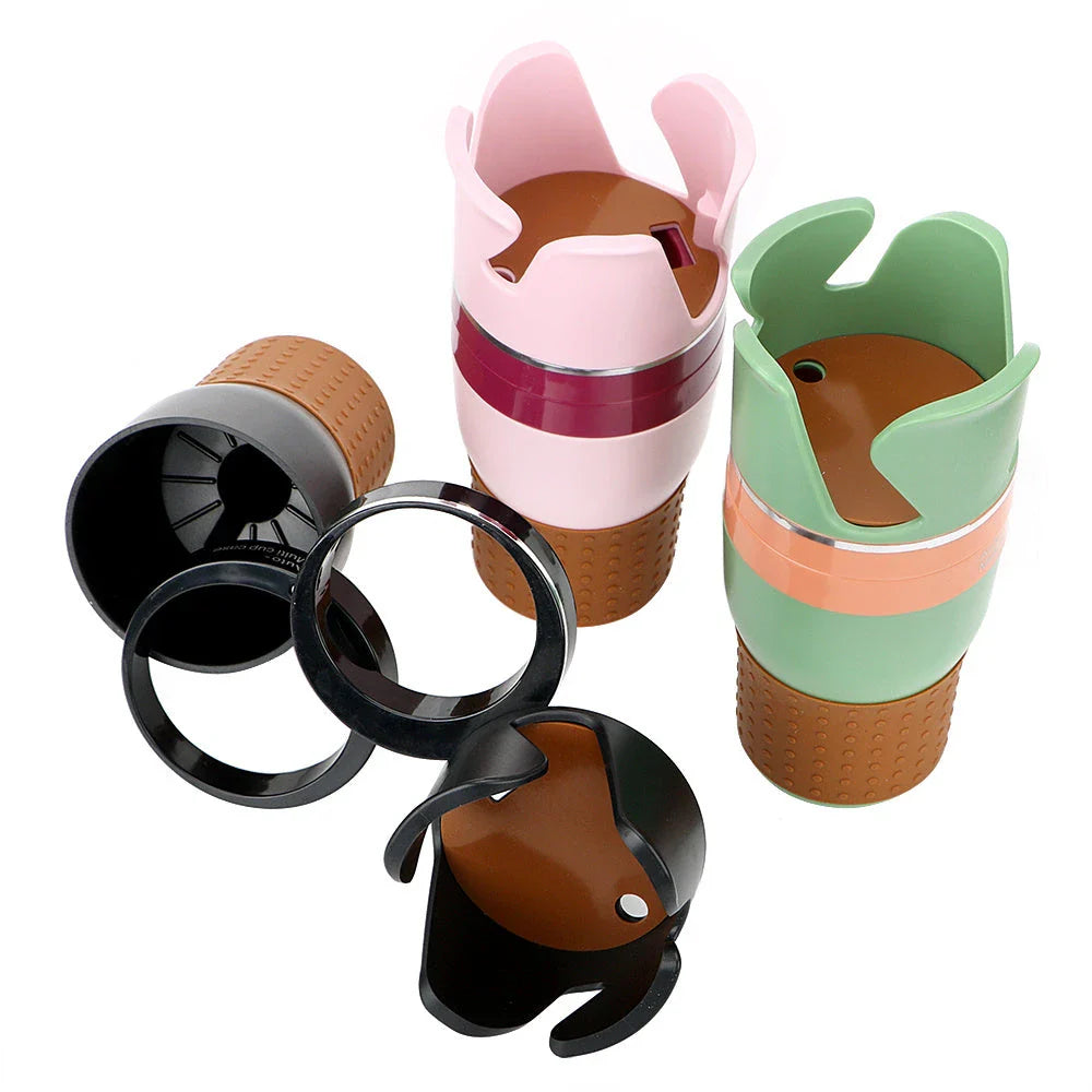 Rotatable ABS car cup holder in green, black, and pink for convenient drink storage