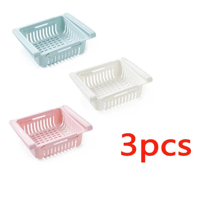 Stretchable refrigerator storage basket in white, blue, pink, and apricot colours