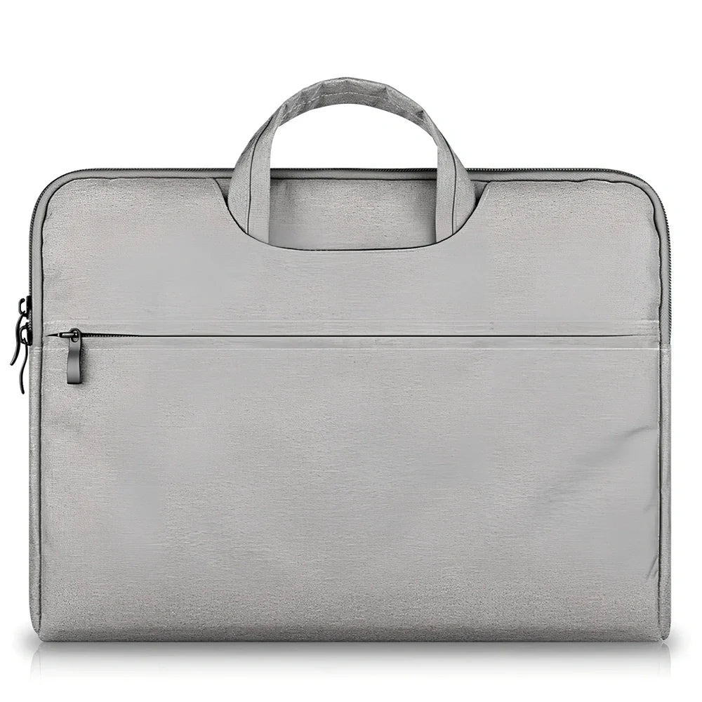 Grey laptop sleeve for MacBook with ant cloth exterior and soft handle, showing internal plush lining
