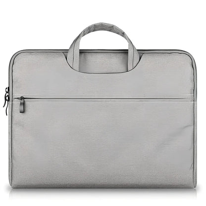 Grey laptop sleeve for MacBook with ant cloth exterior and soft handle, showing internal plush lining