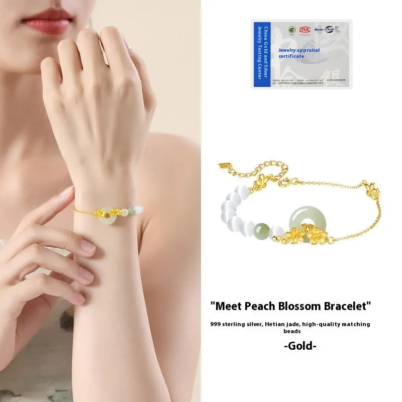 Pure silver women's bracelet with peach blossom design and safety buckle closure in white gold colour