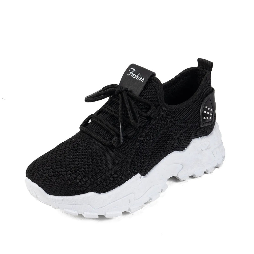 Women's white Flyknit mesh casual sports shoes with flat heel and lace-up front on a neutral background.
