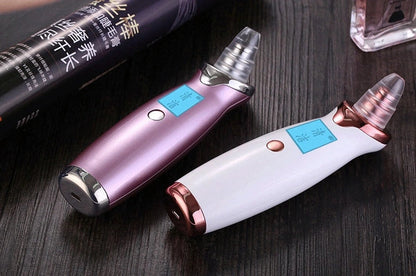 Blackhead vacuum cleaner with digital display showing 53KPa suction power and rose gold finish