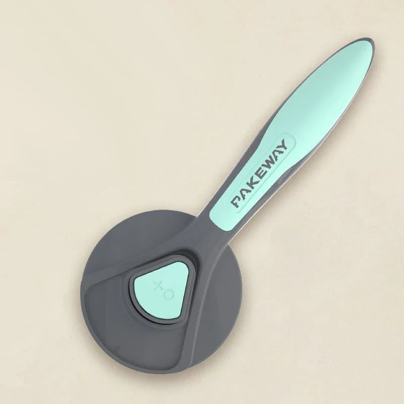 Ergonomic pet grooming brush in mint green, cherry blossom powder, and gentleman grey