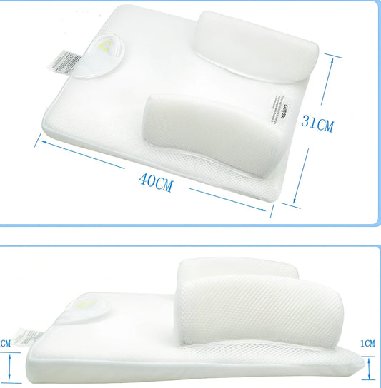 White baby sleep positioning pad with curved armrest and elevated head section