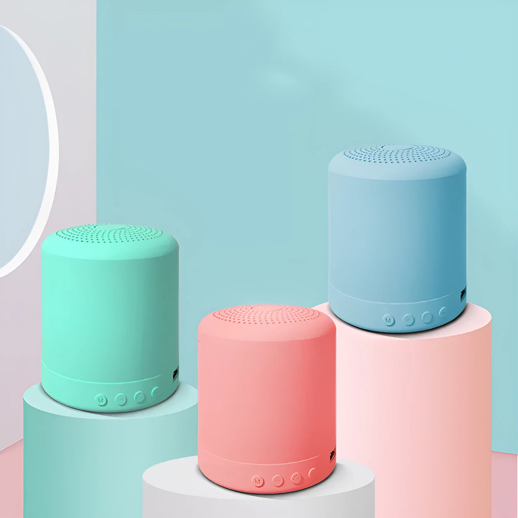 A11 compact wireless subwoofer stereo speaker in black, pink, blue, or green colour options
