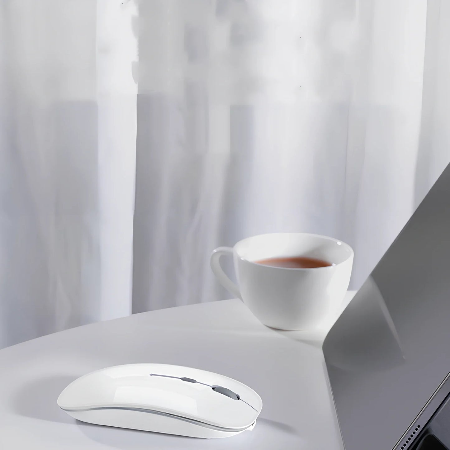 Wireless Bluetooth mouse for Apple devices with 1600 DPI resolution and rechargeable battery