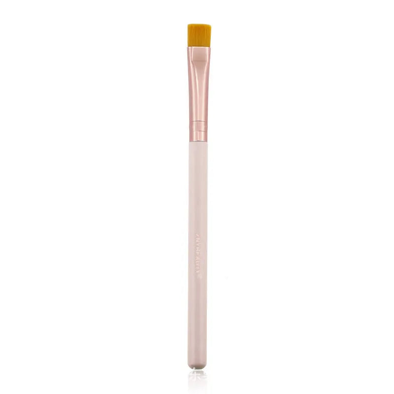 26-piece pink makeup brush set with wooden handles displayed in a PU storage bag