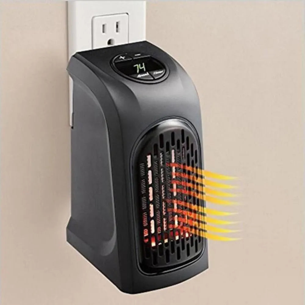 Compact black ceramic fan heater with rotatable EU plug on a desk