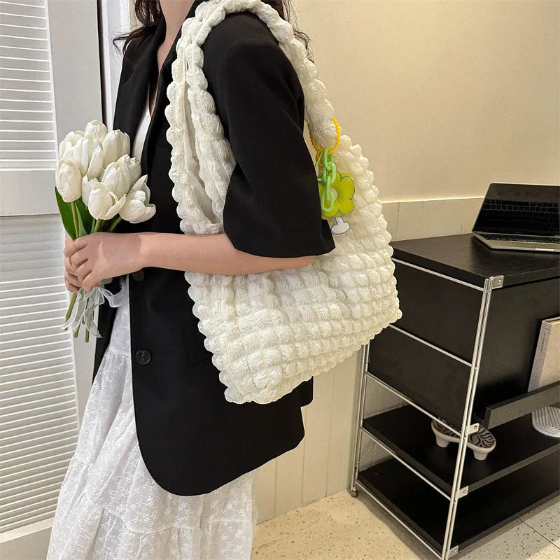 Women's pleated bubble handbag in five colour options with three-dimensional pockets