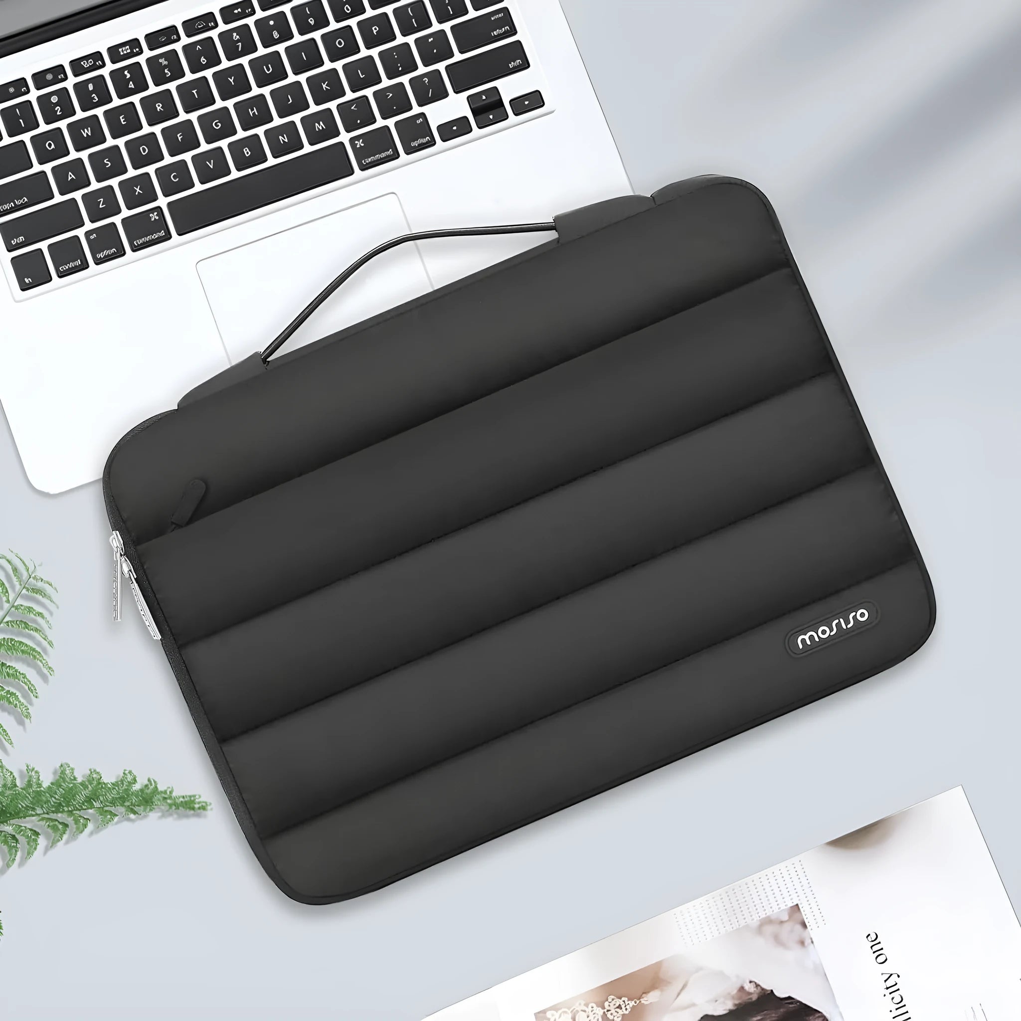 Solid colour velvet laptop bag with plaid detail for a 13.3 or 15.4 inch device.