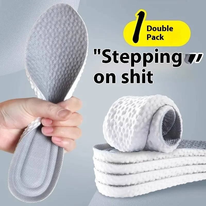 A pair of grey breathable PU foam sports insoles on a white background, showing their texture and trimmable design.