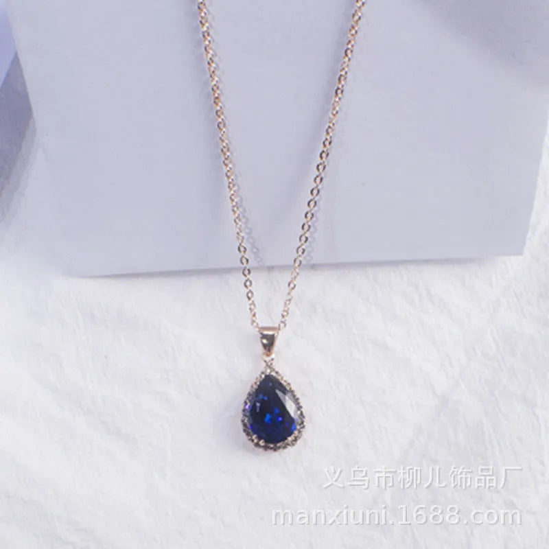 Women's alloy drop necklace with geometric rhinestone pattern in pink rose gold colour