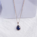 Women's alloy drop necklace with geometric rhinestone pattern in pink rose gold colour