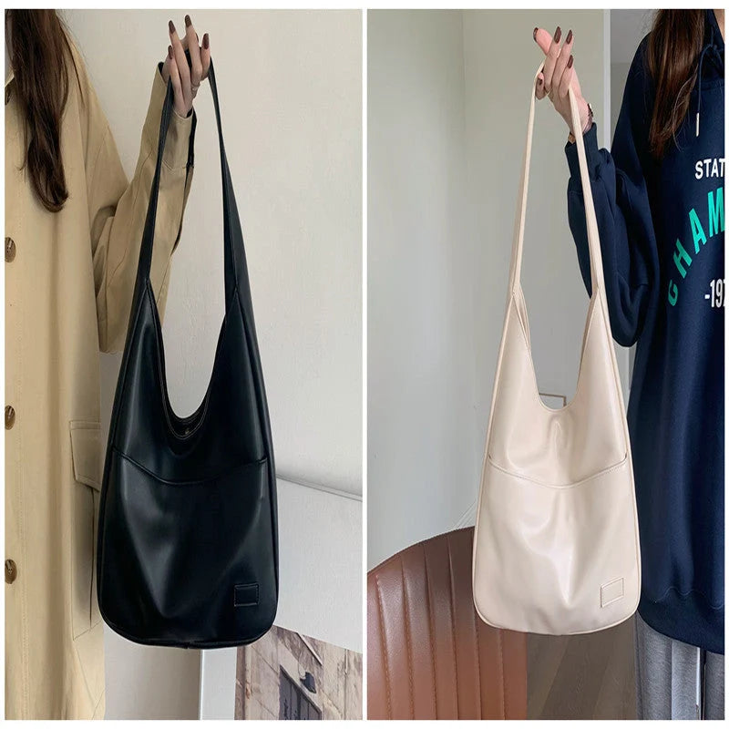 Large capacity PU tote bag for women in brown, black, and white with sewing thread detailing
