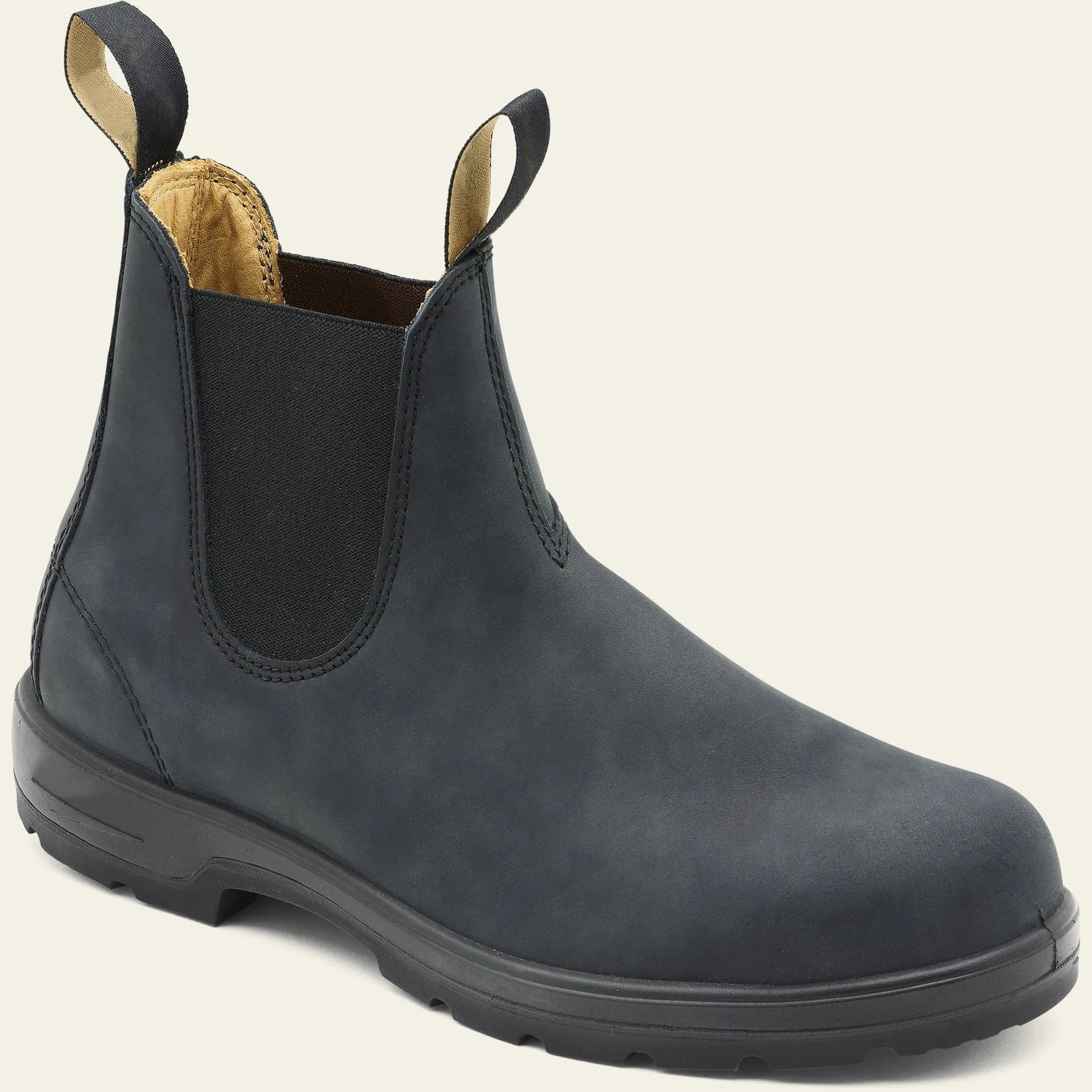 A pair of vintage-style brown unisex Chelsea boots with a round toe and low horseshoe heel.