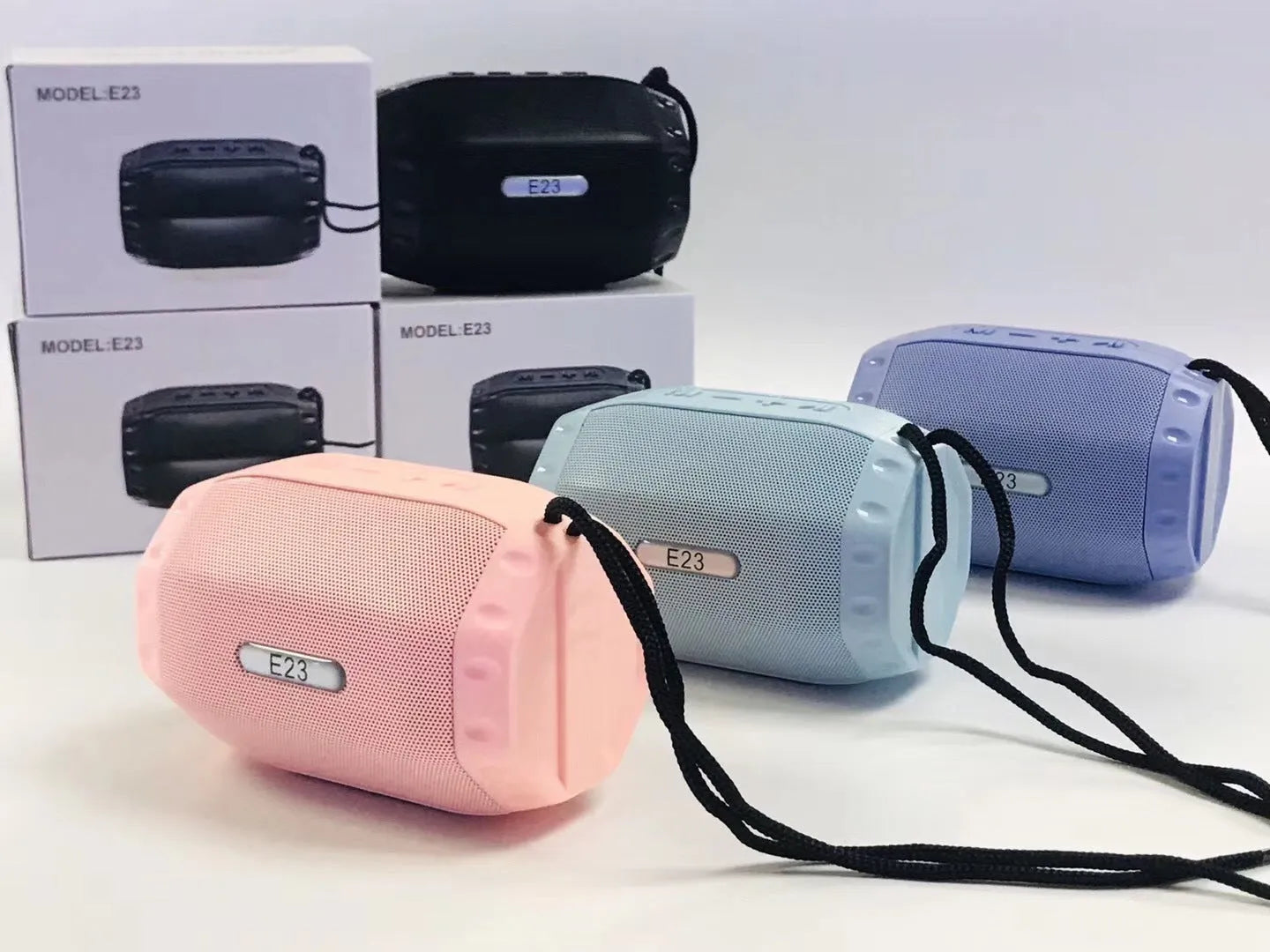 Slim USB card shaped Bluetooth speaker in black, blue, pink, and purple colour options