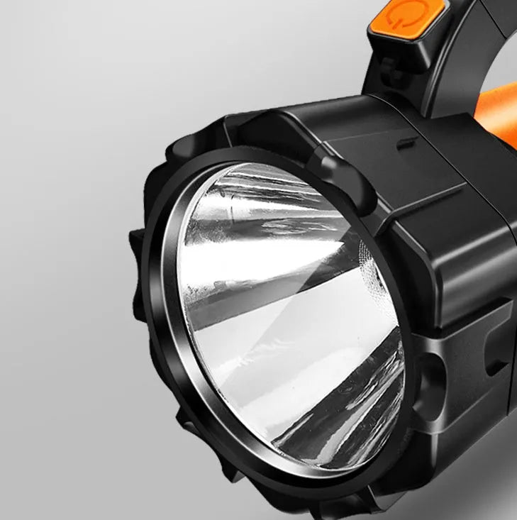 H771 portable LED camping and work light with removable battery and shoulder strap.