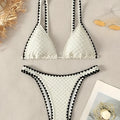 Women's white and blue split bikini swimsuit with briefs for swimming